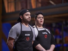 MasterChef Canada contestant Cryssi Larocque reacts as London native Rozin Abbas, left, is eliminated for failing to impress the judges on the CTV reality show in a replication challenge for the Spanish dish, fideuà, which is similar to paella.