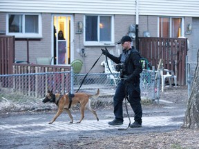 Police were searching for a at least one suspect after a man in his 20's was stabbed in the head inside unit of 1481 Limberlost Road at approximately 7:30pm in London, Ont. on Tuesday. (Derek Ruttan/The London Free Press)