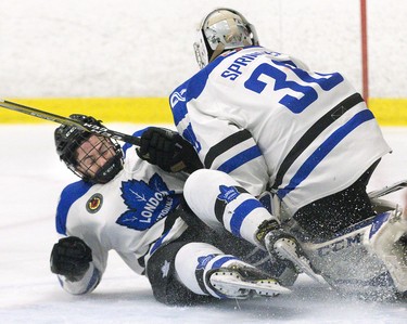 London Nationals defenceman Adam Weiner crashes into his goalie, Zachary Springer, during their game against the Leamington Flyers at Western Fairs Sports Centre  in London, Ont. on Wednesday April 3, 2019. Derek Ruttan/The London Free Press/Postmedia Network