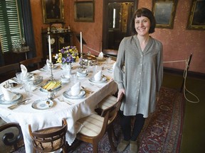 Program co-ordinatior Danielle Costello stands next to the dining room table at Eldon House in London, Ont. on Thursday April 4, 2019. Charles MacPherson, who runs a successful butler training school, is visiting London to share his knowledge with a table-setting workshop and talk on May 5, 2019. Derek Ruttan/The London Free Press