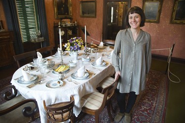 Program co-ordinatior Danielle Costello stands next to the dining room table at Eldon House in London, Ont. on Thursday April 4, 2019. Charles MacPherson, who runs a successful butler training school, is visiting London to share his knowledge with a table-setting workshop and talk on May 5, 2019. Derek Ruttan/The London Free Press