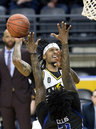 Mo Bolden  of the London Lightning shoots over Akeem Ellis of the Kitchener-Waterloo Titans during their NBL playoff game at Budweiser Gardens in London, Ont. on Thursday April 4, 2019. Derek Ruttan/The London Free Press/Postmedia Network