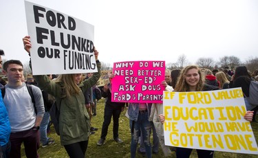 Students from A.B. Lucas high school in London hold signs protesting the Ford government's planned education overhaul. Rebecca Kellock, Madi Muggeridge and Shauna Dworatzek are shown here. Photograph taken on Thursday April 4, 2019.  Mike Hensen/The London Free Press