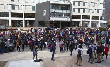 Central and Beal high school students joined forces to form a large protest outside London city hall. They were protesting Premier Doug Ford's proposed education overhaul, and the demonstration grew so large London police had to disperse the crowd. Photograph taken on Thursday April 4, 2019.  Mike Hensen/The London Free Press/Postmedia Network