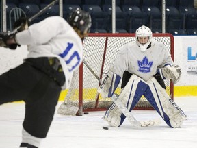Bryce Kilbourne takes a shot on Zachary Springer during London Nationals practice at Western Fair Sports Centre on Tuesday April 9, 2019. (Derek Ruttan/The London Free Press)