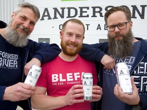 Andrew Peters and Dave Reed, co-owners of London's Forked River brewery, flank Gavin Anderson of Anderson Ale. They are collaborating on a beer that should be available at the start of May. (Mike Hensen/The London Free Press)