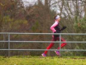 Laura Batterink makes short work of her 16-kilometre run as she heads toward Springbank Park from the forks of the Thames on Sunday April 14, 2019. Mike Hensen/The London Free Press/Postmedia Network