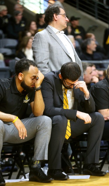 London Lightning owner Vito Frijia watches the season slip away as assistant coach Chad Briggs and head coach Elliot Etherington consider what went wrong late in the 5th and final game of the team's playoff series against the Kitchener Waterloo Titans on Sunday at Budweiser Gardens. The Titans dominated in most aspects of the game, including three-point shooting, controlling the paint and defence, The Titans won 103-91, bringing the season to a close for the Bolts. Mike Hensen/The London Free Press/Postmedia Network