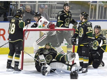 Guelph Storm captain Isaac Ratcliffe was all smiles after teammate MacKenzie Entwistle scored to put the team up 5-3 against the London Knights  during the thirdperiod of their game  in London, Ont. on Tuesday April 16, 2019. Knights players left to right are Liam Foudy, Jordan Kooy, William Lochead, Billy Moskal, and Alec Regula.Derek Ruttan/The London Free Press/Postmedia Network
