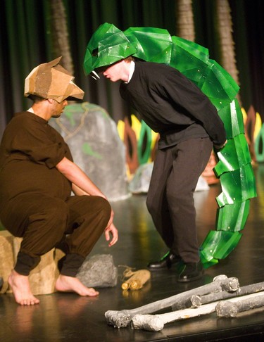 Baloo (Hussam El-Ghussein) starts to fall under the hypnotic spell of Kaa  (Lucas Keen) in Westminster Secondary's production of The Jungle Book in London, Ont.  Photograph taken on Tuesday April 23, 2019.  Mike Hensen/The London Free Press/Postmedia Network