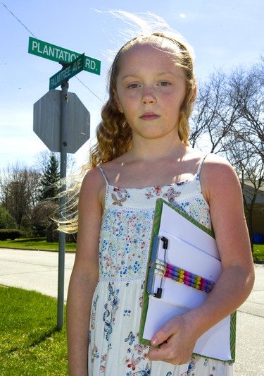 Lyla Wheeler, 9, wants to change the name of her street, because she says Plantation Road is racially charged with memories of slaves working in fields. Lyla has reached out to her neighbours and city hall, but isn't getting a big response. (Mike Hensen/The London Free Press)