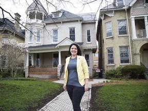 WeedMD's vice-president of people, Josephine DesLauriers, stands in front of the company's future head office at 232 Central Ave. in London. (Derek Ruttan/The London Free Press)