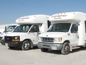 A pair of Voyageur paratransit vans. (File photo)