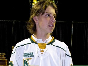 Mitch Marner dons a London Knights jersey on Aug. 22, 2013, just before he opened his first training camp with the team. He was London's No. 1 pick in that spring's OHL draft. MIKE HENSEN/The London Free Press