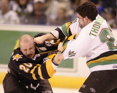 Sarnia Sting player Marco Caprara and Kelly Thomson of the London Knights fight during a 2005 game between the Sarnia Sting and the London Knights.