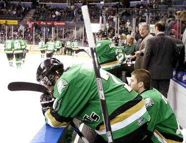 Dejected: London Knights forwards Phil Varone and Sean OConnor set dejectedly on the bench after the Guelph Storm won 5-3 last night at the John Labatt Centre to take a commanding 3-0 lead in their best-of-seven OHL Western Conference quarterfinal game.