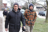 London residents Steven Ravbar, 50, and Matthew Anthony Carapella, 32, who have been charged under a city hall nuisance bylaw, walk into a London court Monday to answer to the charges. JONATHAN JUHA/THE LONDON FREE PRESS