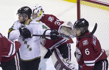 With his team on a five minute power play in the first period, London Knight Matt Rupert took a two minute high sticking penalty for whacking Guelph Storm player Phil Baltisberger during game six of  the Memorial Cup in London, Ont. on Tuesday May 21, 2014. DEREK RUTTAN/London Free Press/QMI Agency