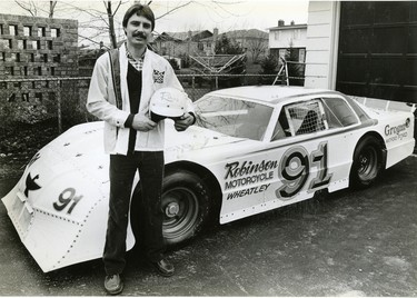 Russ Urlin, London stock car driver and onwer of Budget Car & Truck Rental, stands with his 1983 Thunderbird stock car, 1983. (London Free Press files)