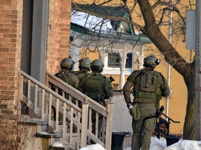 Armed tactical officers were at the scene of a standoff on Main Street in Listowel for much of the afternoon of February 22, 2019. The incident ended peacefully with the arrest of suspect Nathan Chambers in the early evening. (GALEN SIMMONS/THE BEACON HERALD)