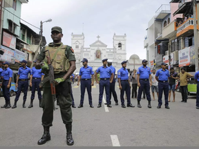 Sri Lankan Army soldiers secure the area around St. Anthony's Shrine after a blast in Colombo, Sri Lanka. Eranga Jayawardena / AP