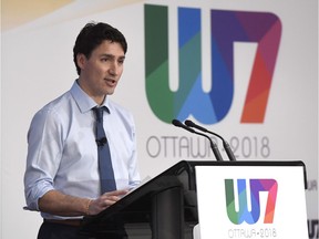 Prime Minister Justin Trudeau delivers remarks at the W7: Feminist Visions for the G7 meeting in Ottawa in April 2018. His government has introduced a host of measures aimed at improving equality for women.