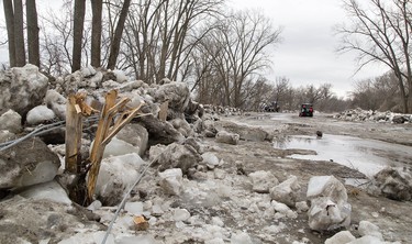 City of Brantford operational services crews have started clearing the ice jam on Gilkison Street in Brantford. About 1,200 tons of ice have been hauled away to the Earl Avenue snow dump facility over the past four days. Gilkison Street will reopen once road repairs have been completed and deemed safe for pubic use. Brantford Parks and Recreation anticipates the adjacent trails at Gilkison Flats will reopen in mid- to late-April.  Brian Thompson/The Expositor  ORG XMIT: POS1903141622142527