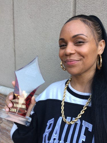 Sum-01 with her first Forest City London Music Award for hip hop outside London Music Hall Sunday. (JOE BELANGER, The London Free Press)