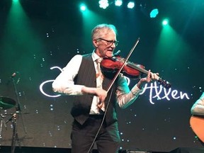Legendary fiddler John P Allen performs Orange Blossom Special after his induction to the Forest City London Music Hall of Fame Sunday at London Music Hall. (JOE BELANGER, The London Free Press)