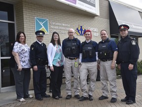 Mental health clinicians and police officers participating in the MHEART program, which started in September 2018. (Kathleen Saylors/Woodstock Sentinel-Review)