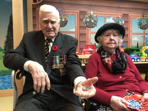 Royal Canadian Navy veteran Arthur Stenning, and his wife of 72 years Glenna were among the veterans at Parkwood Institute to make beads for young patients at Children’s Hospital. The beads are handed out to patients for being brave during treatments and procedures at the hospital. (Jennifer Bieman/The London Free Press)
