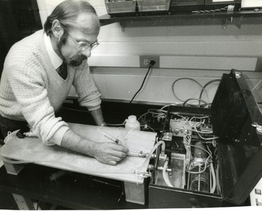 Aaron Fenster and his Robarts Research Institute team have developed a computer-driven pump that can simulate blood flow in order to test ultra-sound machines, 1990. (London Free Press files)
