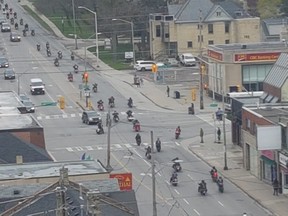 Around 200 motorcyclists, including members of outlaw motorcycle clubs, rumbled down Richmond Row in London on Saturday. The OPP's biker enforcement unit monitored the convoy's movements. (Reddit photo)