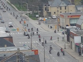 Around 200 motorcyclists, including members of outlaw motorcycle clubs, rumbled down Richmond Row in London on May 4. The OPP's biker enforcement unit monitored the convoy's movements. (Reddit photo)