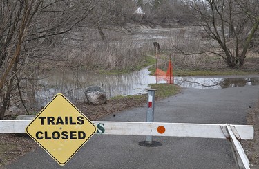 Trails in the area of Gilkison Flats adjacent to the Grand River in Brantford are closed Wednesday, April 10, 2013 and the Grand River Conservation Authority has issued a flood warning throughout the watershed.  The GRCA says that 30-45mm of rain has fallen in the area over the past two days, and another 50-70mm is possible by Friday, swelling streams and rivers including the Grand, Nith, Speed and Conestogo Rivers. BRIAN THOMPSON/BRANTFORD EXPOSITOR/QMI Agency