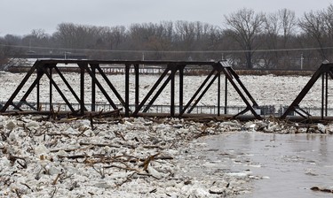 The Grand River, choked with ice and debris is as high as the former CNR bridge, now a pedestrian bridge. Police have closed the Lorne Bridge, as well as the Veterans Memorial Parkway bridge, and issued evacuation orders for several areas of Brantford. The city has declared a state of emergency as levels of the Grand River have risen significantly and are expected to peak at 2:00 p.m. today. Brian Thompson/Brantford Expositor/Postmedia Network ORG XMIT: POS1802211119257069