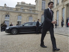 Prime Minister Justin Trudeau emerges from a meeting in Paris, France, in November, 2015. Trudeau was in Paris to attend the United Nations climate change summit.