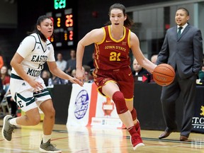 Iowa State Cyclones' Bridget Carleton (21) dribbles past Eastern Michigan Eagles' Natalia Pineda in the second quarter at St. Clair College's Thames Campus HealthPlex in Chatham, Ont., on Wednesday, Nov. 21, 2018. (Mark Malone/Postmedia Network)
