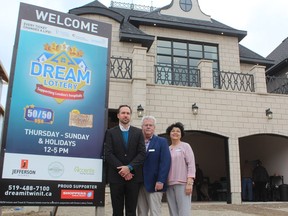 Dream Lottery officials -- Ryan Byrne, left, communications manager for the St. Joseph's Health Care Foundation, Ron Mikula, chair of the London Health Sciences Centre Foundation, and Sara Steers, director of philanthropy for the Children's Health Foundation -- showcase the two London homes up from grabs in the biannual lottery on Thursday. The public was invited to tour the houses at 2167 Ironwood Rd., pictured here, and 2162 Ironwood Rd. following a ribbon-cutting ceremony. The spring edition of the lottery will add to the nearly $35 million raised for the Children's Hospital at London Health Sciences Centre, St. Joseph's Health Care London and London Health Sciences Centre. Open house times and lottery details are available at dreamitwinit.ca. (Dale Carruthers/The London Free Press)