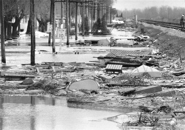 HISTORIC-MAR.20/1973- Debris from the weekend flood lines the CNR tracks about three miles east of Stoney Point. (The Windsor Star-Jack Dalgleish) USED ONLINE
