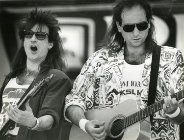 Wolf Hassel, bass player and Arnold Lannie, lead singer of Frozen Ghost perform in Victoria Park, 1989. (London Free Press files)