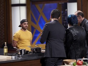 London native Rozin Abbas faces the judges during Monday's MasterChef Canada show in a redemption round testing knife skills. He won the round to return to the series after being eliminated two weeks ago.