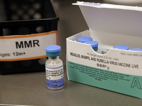 A dose of the measles, mumps and rubella vaccine is displayed. (File photo)