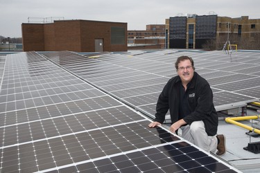 Thomas Davis, professor in Fanshawe College's Donald J. Smith School of Building Technology has installed 600 photovoltaic panels  on the roof of the college's H-Building in London. (Derek Ruttan/The London Free Press)