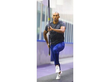 Decathlete Damian Warner works on his run during pole vault practice in Western University's Thompson Arena in London on Wednesday. (Mike Hensen/The London Free Press)