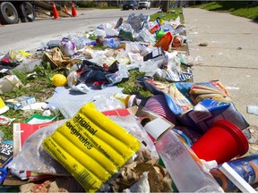 The annual piles of debris left on London curbs by departing Western University students is a sore point with one Western professor, who argues more should be done to teach students about alternatives. (MIKE HENSEN, The London Free Press)