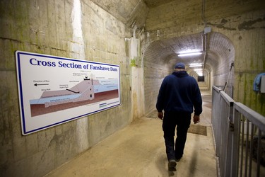 Jeff Cantelon, a dam maintenance worker for the Upper Thames River Conservation Authority (UTRCA) walks through an inspection tunnel in Fanshawe Dam 30 metres below the road surface. These tunnels allow inspection of the dam constructed in 1950-52 at a cost of $5 million (structure and land) Mike Hensen/The London Free Press/Postmedia Network
