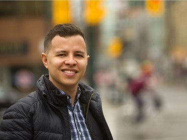 Colombian native Jonathan Juha, a Free Press reporter, and his wife face an important hurdle Wednesday: the Canadian citizenship test. (Mike Hensen/The London Free Press)