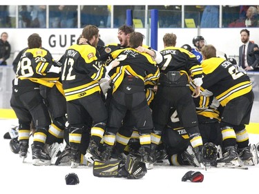 The Waterloo Siskins celebrate after a 3-2 overtime win against London Nationals   in London, Ont. on Wednesday May 8, 2019.  (Derek Ruttan/The London Free Press)