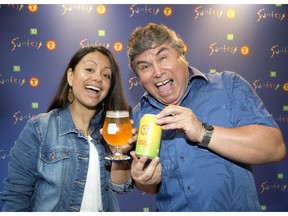 Sunfest executive director Alfredo Caxaj and daughter Mercedes Caxaj, Sunfest co-artistic director, are excited SunFest Cerveza, brewed by Anderson Craft Ales, will make its debut at the music festival this summer. (DEREK RUTTAN, The London Free Press)